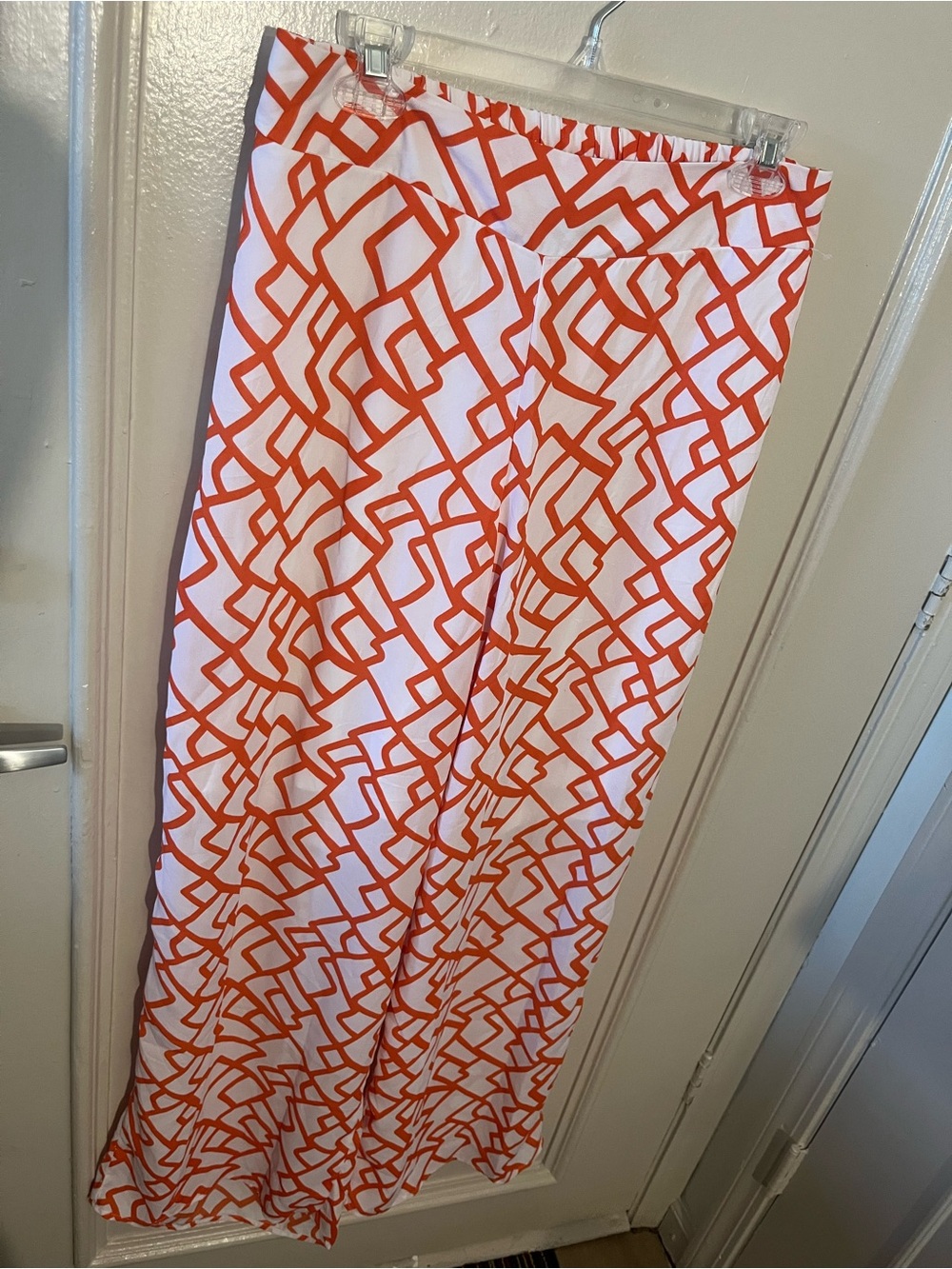 Ashley Stewart White and Orange wide leg pants Geometric Print